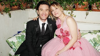 Kaley Cuoco shares pic of boyfriend Tom Pelphrey kissing her baby bump in sweet pregnancy photo shoot