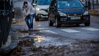 Portugal woman found dead after overnight rains flood Lisbon