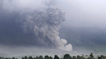 Indonesian volcano erupts, releasing river of lava