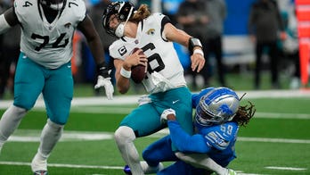 Jaguars' Trevor Lawrence writhes in pain after taking scary hit vs. Lions