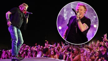 Axl Rose ends Guns N' Roses concert ritual after fan 'hurt' by microphone toss into crowd