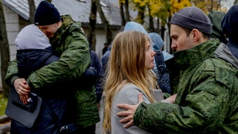 Russia plans digital draft after thousands dodge military service, flee country