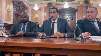Illinois lawmakers tweak sweeping crime bill, target cash bail