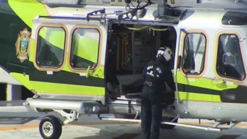 Miami-Dade police officer shot in the face, hospitalized; suspect in custody