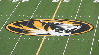 Missouri teammates fight each other on field after Tigers player tries to help up opposing QB