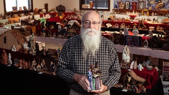 At Christmas season, Iowa man aims for world record for largest Nativity scenes collection