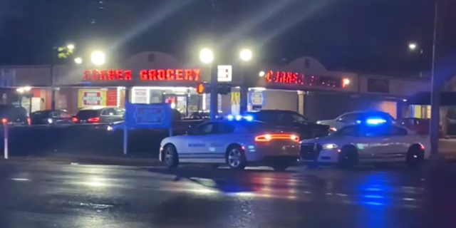 Police cars at shooting of officer at Memphis gas station.