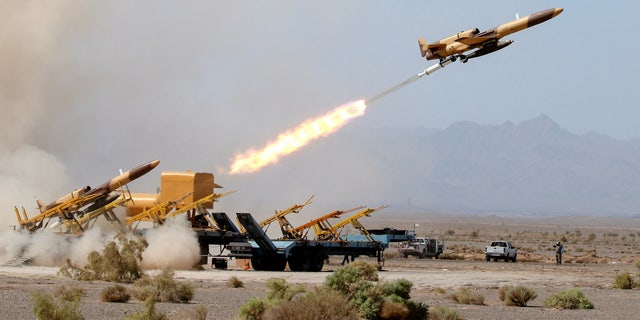 In this handout photo taken on Aug. 25, 2022, an unmanned aerial vehicle is launched during an Iranian military exercise in an undisclosed location. 