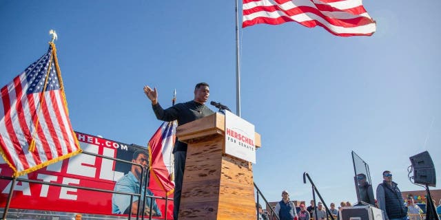 Republican U.S. Senate candidate and former football player Herschel Walker speaks during an event ahead of the runoff election against Senator Raphael Warnock in Warner Robins, Georgia, Dec. 2, 2022.