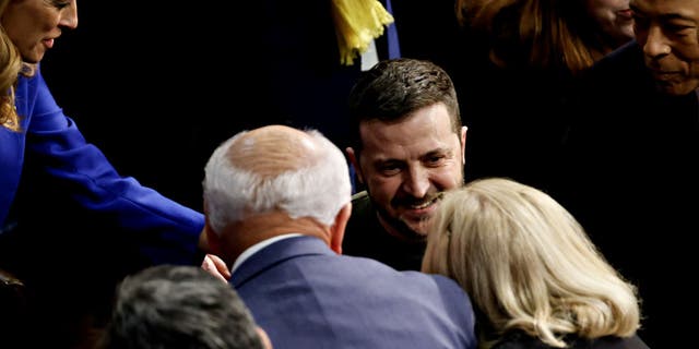 Volodymyr Zelenskyy, Ukraine's president, center, exits after speaking during a joint meeting of Congress at the US Capitol in Washington, DC, US, on Wednesday, Dec. 21, 2022. (Ting Shen/Bloomberg via Getty Images)