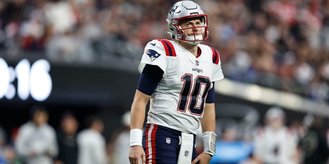 Mack Jones of the New England Patriots reacts during the game against the Las Vegas Raiders at Allegiant Stadium on December 18, 2022 in Las Vegas.