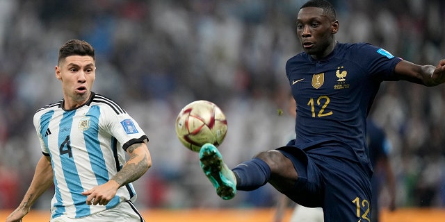 France's Randal Kolo Muani reaches for the ball during the World Cup final in Lusail, Qatar, Sunday, Dec. 18, 2022.