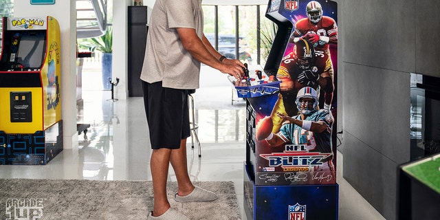 Football fans will love another Arcade1up's latest machine, the first and only home NFL arcade experience