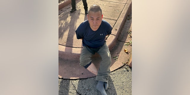 This photo released by the U.S. Marshals Service shows Chen Wu following his arrest by the Miami Beach Police on Tuesday, Nov. 22, 2022, in South Florida.