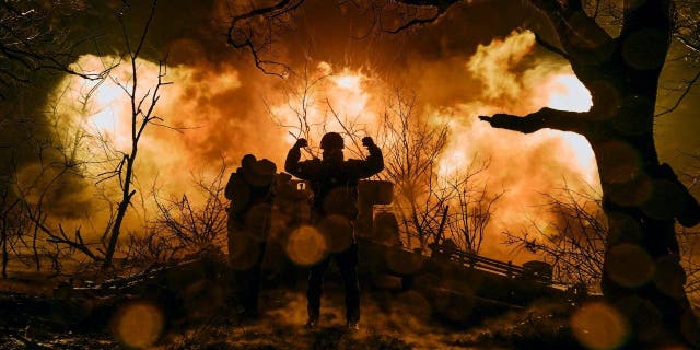 Ukrainian soldiers fire artillery at Russian positions near Bakhmut, Donetsk region, Ukraine, on Nov. 20, 2022. 