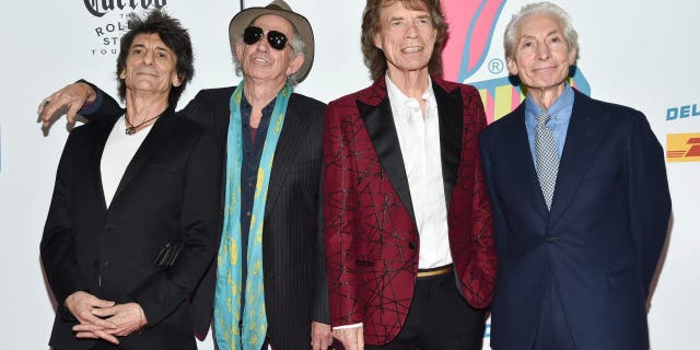 The Rolling Stones, from left, Ronnie Wood, Keith Richards, Mick Jagger and Charlie Watts attend the opening night party for "Exhibitionism" in New York on Nov. 15, 2016.