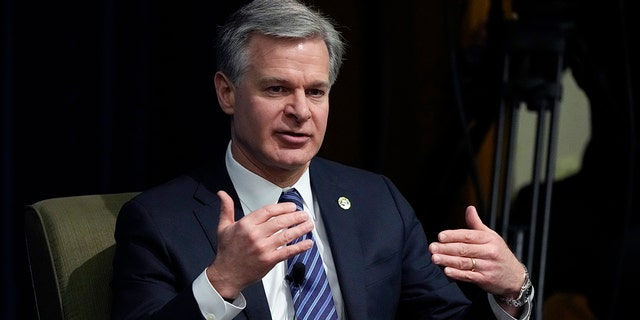 Speaking at the University of Michigan's Gerald R. Ford School of Public Policy in Ann Arbor, Michigan, Friday, Dec. 2, 2022, FBI Director Christopher Wray raises national security concerns about TikTok, saying Friday that the popular Video-sharing app in Chinese government hands "It doesn't share our values." 