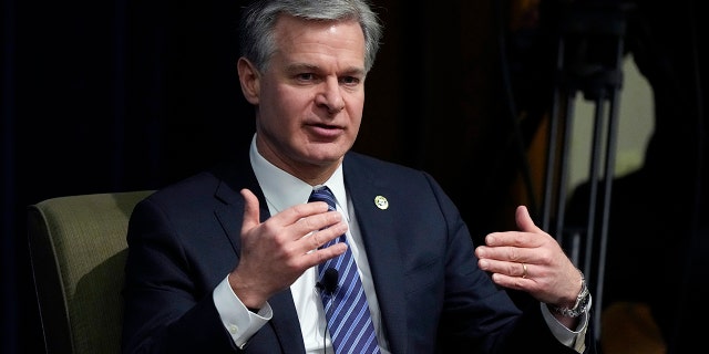 Speaking at the University of Michigan's Gerald R. Ford School of Public Policy in Ann Arbor, Michigan, Friday, Dec. 2, 2022, FBI Director Christopher Wray raises national security concerns about TikTok, saying Friday that the popular Video-sharing app in Chinese government hands "It doesn't share our values."