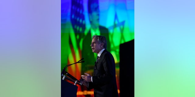 Secretary of State Anthony Blinken speaks as his image is shown on a large screen behind him at the J Street National Conference at the Omni Shoreham Hotel in Washington, DC on December 4, 2022. 