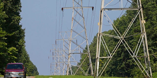 FILE - Power transmission lines deliver electricity to rural Orange County on Aug. 14, 2018, near Hillsborough, N.C. Investigators believe a shooting Saturday, Dec. 3, 2022, that damaged power substations in North Carolina was a crime. The shooting serves as a reminder for why experts have stressed the need to secure the U.S. power grid. Authorities have warned that the nation's electricity infrastructure could be vulnerable targets for domestic terrorists. 