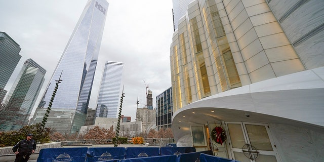 One World Trade, left, is seen next to St. Nicholas Greek Orthodox Church in Lower Manhattan on Tuesday, Dec. 6, 2022.