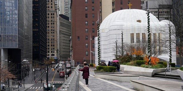 St. Nicholas Greek Orthodox Church, right, sits next to ground zero in New York City on Tuesday, Dec. 6, 2022.