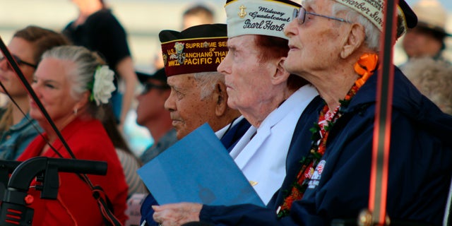 Pearl Harbor survivors and other military veterans observe a ceremony on Wednesday, Dec . 7, 2022, in Pearl Harbor, Hawaii in remembrance of those killed in the 1941 attack. 