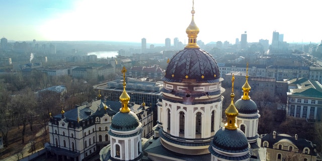 A hole from a shell explosion in the damaged dome of an Orthodox church is seen after what Russian officials in Donetsk said was a shelling by Ukrainian forces, in Donetsk, the capital of Russian-controlled Donetsk region, eastern Ukraine, Thursday, Dec. 15, 2022.