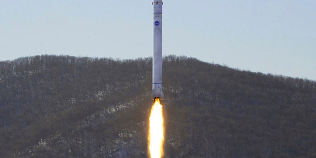 This photo provided by the North Korean government, shows what it says a test of a rocket with the test satellite at the Sohae Satellite Launching Ground in North Korea Sunday, Dec. 18, 2022.