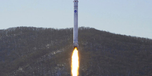 This photo provided by the North Korean government, shows what it says a test of a rocket with the test satellite at the Sohae Satellite Launching Ground in North Korea Sunday, Dec. 18, 2022. 