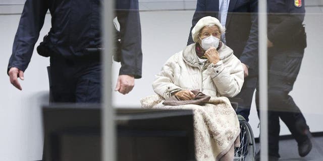 Irmgard Furchner, accused of being part of the apparatus that helped the Nazis' Stutthof concentration camp function, appears in court for the verdict in her trial in Itzehoe, Germay, Tuesday, Dec. 20, 2022. 