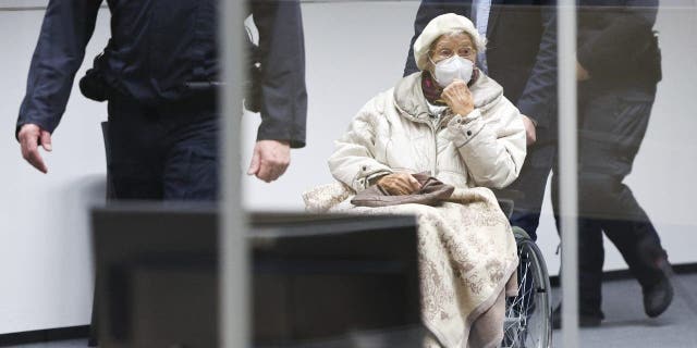 Irmgard Furchner, accused of being part of the apparatus that helped the Nazis' Stutthof concentration camp function, appears in court for the verdict in her trial in Itzehoe, Germay, Tuesday, Dec. 20, 2022.