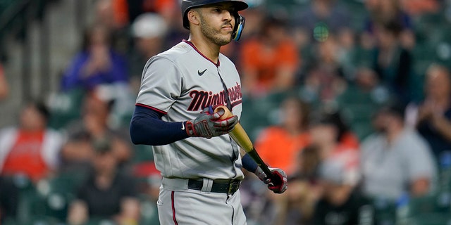Carlos Correa of ​​the Minnesota Twins walks to the dugout after striking out against Baltimore Orioles starting pitcher Tyler Wells during the fourth inning of a game on May 2, 2022 in Baltimore.