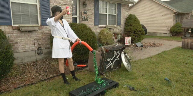 A 'Cousin Eddie' Christmas display is shown in the Dogwood subdivision of Shepherdsville, Kentucky, on Dec. 21, 2022. The display looked a little too real and police were called to check it out. Officers arrived to find a mannequin decorated like the character from "National Lampoon's Christmas Vacation." Homeowner Joni Keeney said she decided to put up the display from her favorite Christmas movie to have some fun. (WDRB via AP)