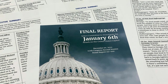 The final report released by the House select committee investigating the Jan. 6 attack on the US Capitol, is photographed Thursday, Dec. 22, 2022. 