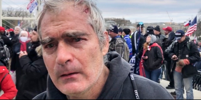 FILE - This image from video recorded Jan. 6, 2021, captures Vincent Gillespie on the grounds of the U.S. Capitol in Washington, where prosecutors say he was among a rioting mob trying to gain control of the building from the federal government.