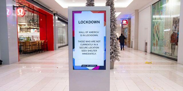 Signs around the Mall of America indicate that a lockdown is in progress after a shooting was reported Friday, Dec. 23, 2022 in Bloomington, Minn.