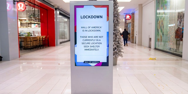 Signs around the Mall of America indicate that a lockdown is in progress after a shooting was reported Friday, Dec. 23, 2022, in Bloomington, Minnesota.