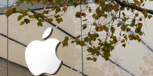 The Apple logo is seen at the entrance to the Apple store in Brussels, Belgium, on Nov. 28, 2022.