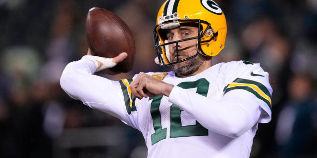 Green Bay Packers quarterback Aaron Rodgers throws before an NFL football game against the Philadelphia Eagles, Sunday, Nov. 27, 2022, in Philadelphia.