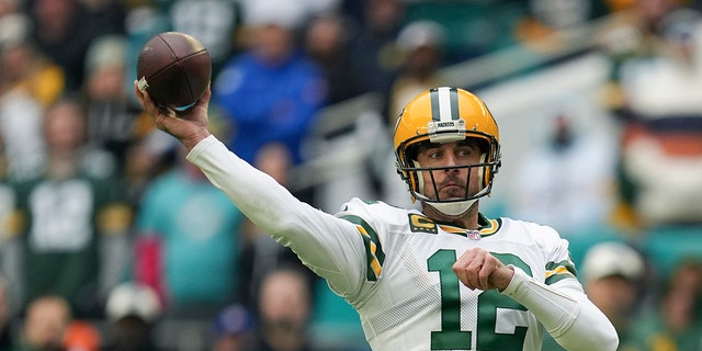 Green Bay Packers quarterback Aaron Rodgers passes against the Miami Dolphins at Hard Rock Stadium in Miami Gardens, Florida on December 25, 2022.