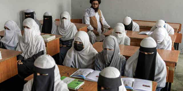 Afghan girls attend a school in Kabul, Afghanistan, on Aug 11, 2022. The Taliban announced on Dec. 6, 2022, that Afghan girls will be allowed to take their high school graduation exams this week.