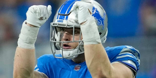 Detroit Lions' Aidan Hutchinson reacts after sacking Minnesota Vikings' Kirk Cousins during the second half, Sunday, Dec. 11, 2022, in Detroit.