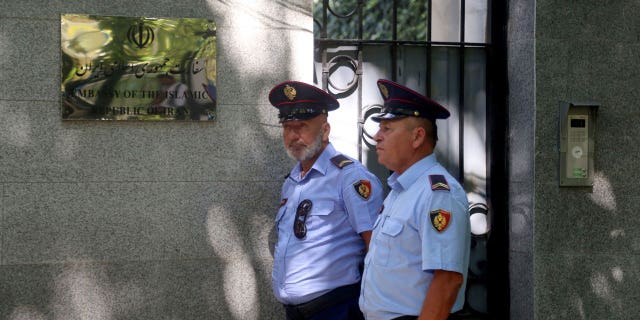 A September cyberattack that temporarily disabled the Albanian government's digital services led to Albania severing diplomatic ties with Iran. Police officers are pictured September 9 walking in front of the Embassy of the Islamic Republic of Iran in Tirana. 7th, 2022.