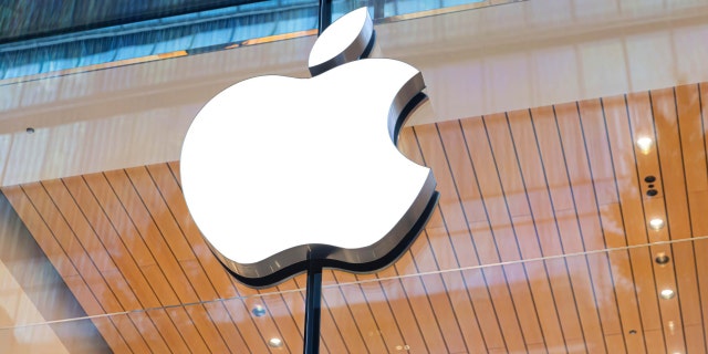 The Apple logo is seen above the entrance of the Apple Store in Tokyo Oct. 20, 2022.