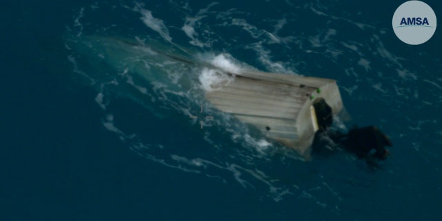 The Queensland man was discovered a little more than one mile away from his upturned dinghy.