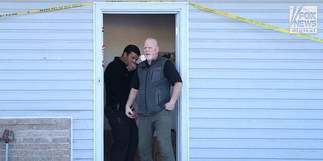 Moscow Police Chief, James Fry helps to transfer the belongings of the victims of the Univeristy of Idaho quadruple homicide which are being removed from the house in Moscow, Idaho, Wednesday, December 7, 2022.