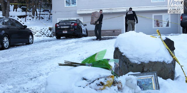 The belongings of the victims of the Univeristy of Idaho quadruple homicide are removed from the house in Moscow, Idaho, Wednesday, December 7, 2022.