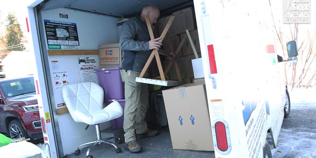 Belongings of the victims of the University of Idaho quadruple homicide are removed from a house in Moscow, Idaho, Wednesday, December 7, 2022.