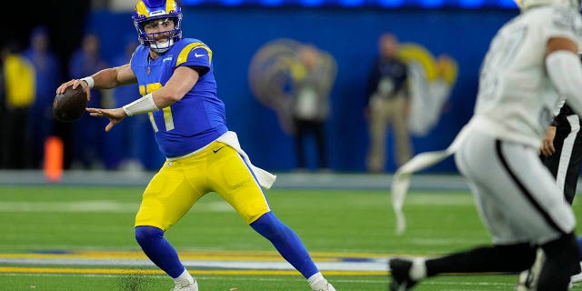 Los Angeles Rams quarterback Baker Mayfield throws a pass during the second half of an NFL football game against the Las Vegas Raiders, Thursday, Dec. 8, 2022, in Inglewood, Calif.